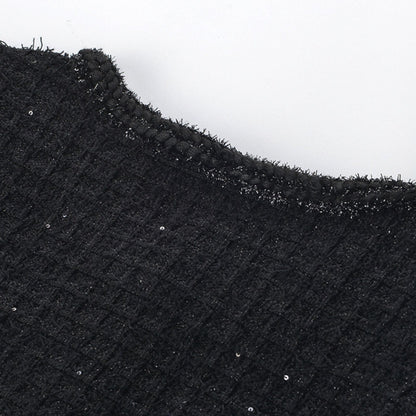 Black waffleknit dress with round neck long sleeves chest flap pockets and front button fastening Made of 80% Polyester and 20% Cotton