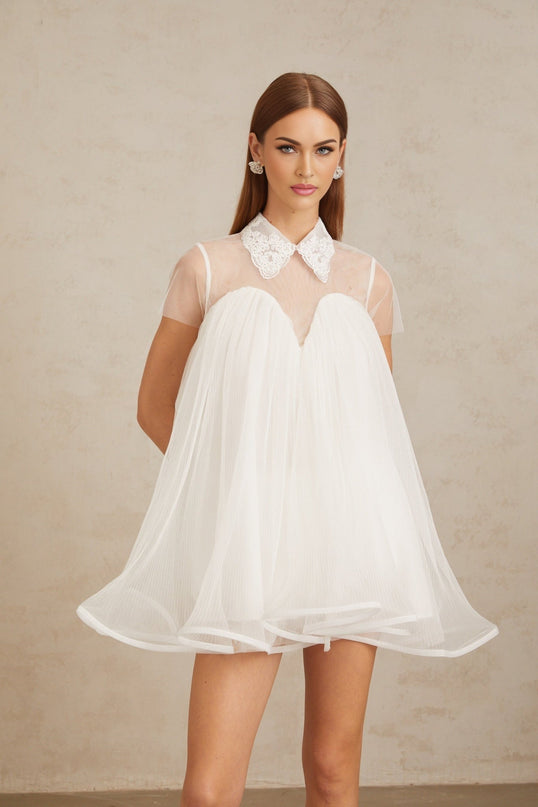 Hope Mini Dress in White Tulle Lace Trim Flounce Hem Lapels Short Sleeves Loose Fit Semi-Sheer Pressed Crease Detailing Rear Button Fastening