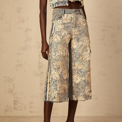 Iliana Blue Lace Panel Wide Leg Jeans Premium Denim High Rise Wide Leg Silhouette Lace Panelling Floral-Lace Detailing Contrast Stitching Frayed Edges Belt Loops Front Button Zip Fastening Five Pockets Cropped Length Luxury Versatility 100% Cotton