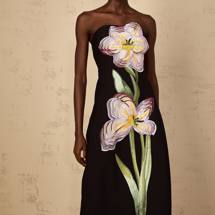 Image of a black offshoulder midi dress with sequin embroidery details named Irene featuring a fitted silhouette and elegant design