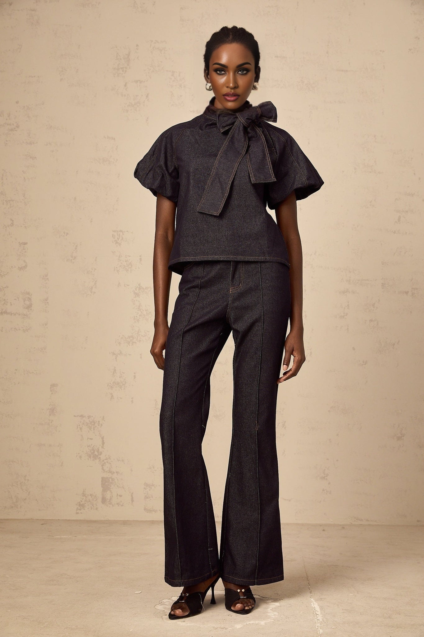 Indigo blue denim matching set with blouse and jeans featuring contrast stitching named Roxane