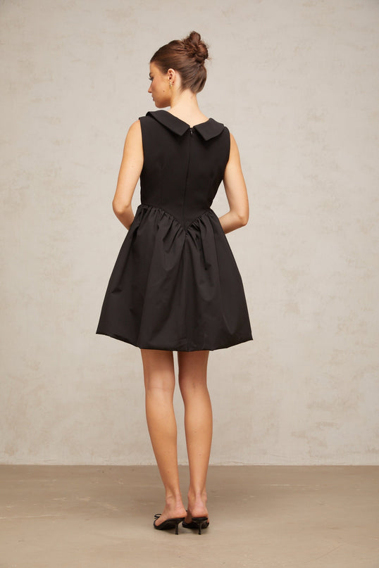 Iolanda Black Mini Dress V Neck Sleeveless Pleated Puff Skirt Thigh Length Rear Zip Fastening Terylene Spandex Blend Elegance Sophistication Fashion Connoisseur