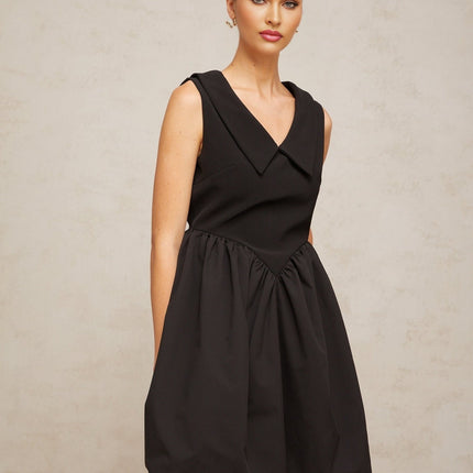 Iolanda Black Mini Dress V Neck Sleeveless Puff Skirt Pleated Detailing Thigh Length Rear Zip Fastening Terylene Spandex Blend