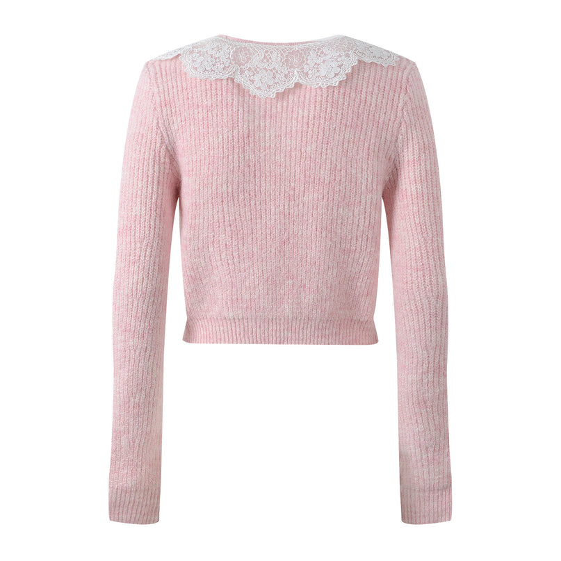 Pastel pink knit cardigan with lace collar and crystal buttons paired with a matching flared skirt