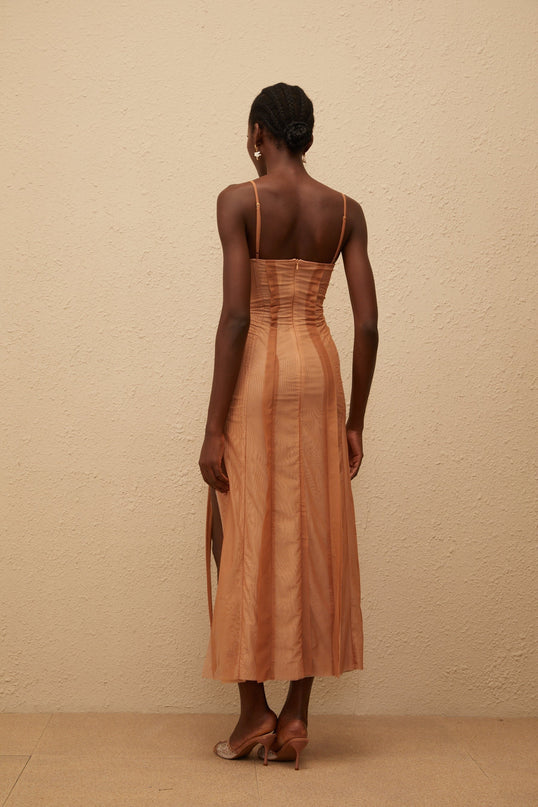 Iside Maxi Dress Brown Tulle Asymmetrical Hem Sweetheart Neckline Spaghetti Straps Fitted Waistline Built-in Cups Rear Zip Fastening Maxi Length 100% Terylene Fiber