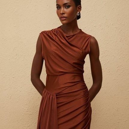 Ivanka Maxi Dress in mesmerizing Brown sleeveless crew neck fitted waistline ruched detailing asymmetrical design side slit effortlessly chic slip-on style maxi length luxurious blend of Terylene fiber and Elastane quality style fashion-forward individual