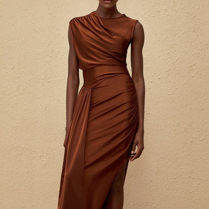 Ivanka Maxi Dress in mesmerizing brown with crew neck, fitted waistline, ruched detailing, and side slit for modern elegance and convenience