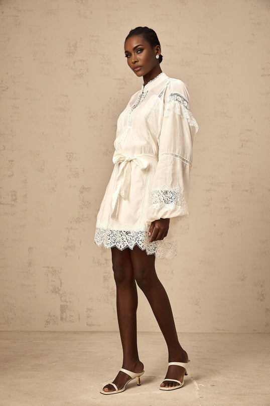 Ivanka White Lace Mini Dress with Ruffle Bow Trim and Crystal-Embellished Buttons