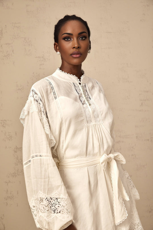 Ivanka White Lace Mini Dress with Ruffle Bow Trim and Crystal-Embellished Buttons
