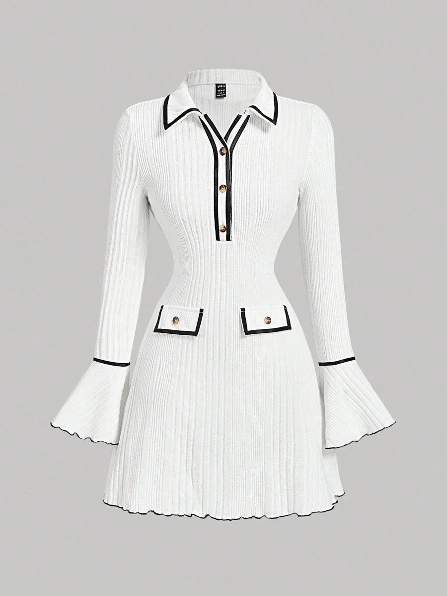 White ribbed knit dress with contrast trim, gold button accents, flared sleeves, and a tailored fit for a sophisticated and modern look