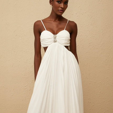 Jacqueline Maxi Dress in White Terylene Fiber Sweetheart Neckline Sleeveless Design Adjustable Straps Cut-Out Detailing Pleated Embellishments Crystal Embellishments Smocked Panel Rear Zip Fastening Maxi-Length Dress