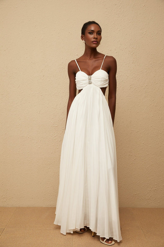 Jacqueline Maxi Dress in White Terylene Fiber Sweetheart Neckline Sleeveless Design Adjustable Spaghetti Straps Cut-Out Detailing Pleated Embellishments Crystal Embellishments Smocked Panel Rear Zip Fastening Maxi-Length Dress Special Occasions Luxury Grace Exquisite Creation