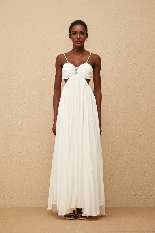 Jacqueline Maxi Dress in White Terylene Fiber Sweetheart Neckline Sleeveless Design Adjustable Straps Cut-Out Detailing Pleated Embellishments Crystal Embellishments Smocked Panel Rear Zip Fastening Maxi-Length Dress Special Occasions Luxury Grace Exquisite Creation