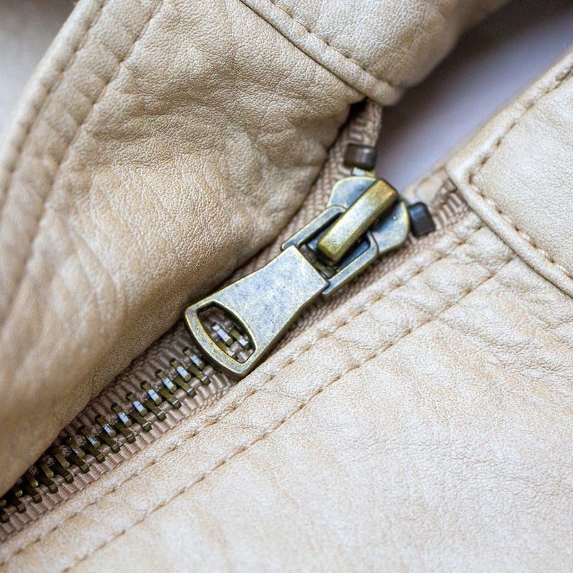 Jane wearing Beige Bomber Jacket with Stand-Up Collar and Zipper Closure