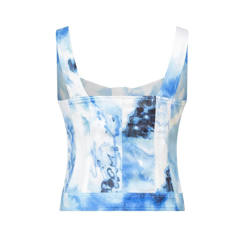 Jane wearing Light Blue Y2K Denim Set Sleeveless Top and Mid-Calf Skirt