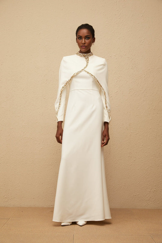 Jane wearing Lune White Embellished Shawl Design Gown with crystal and rhinestone embellishments