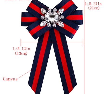 Jane wearing Red/Green fabric ribbon bow brooches with sparkling rhinestones for elegant outfit enhancement