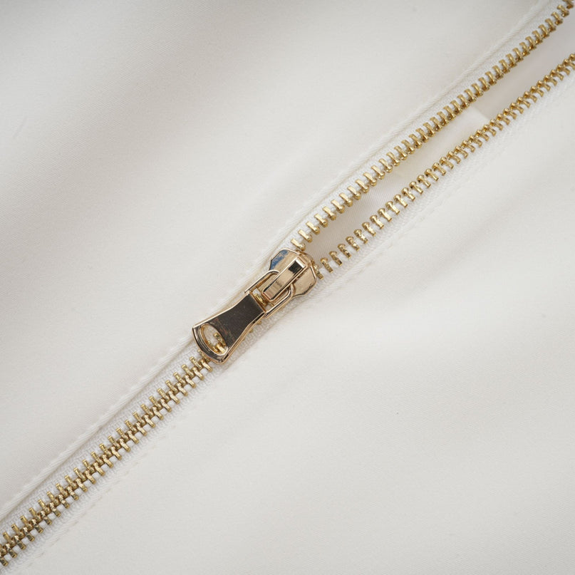 Jeanne white crystalembellished top  skirt matching set