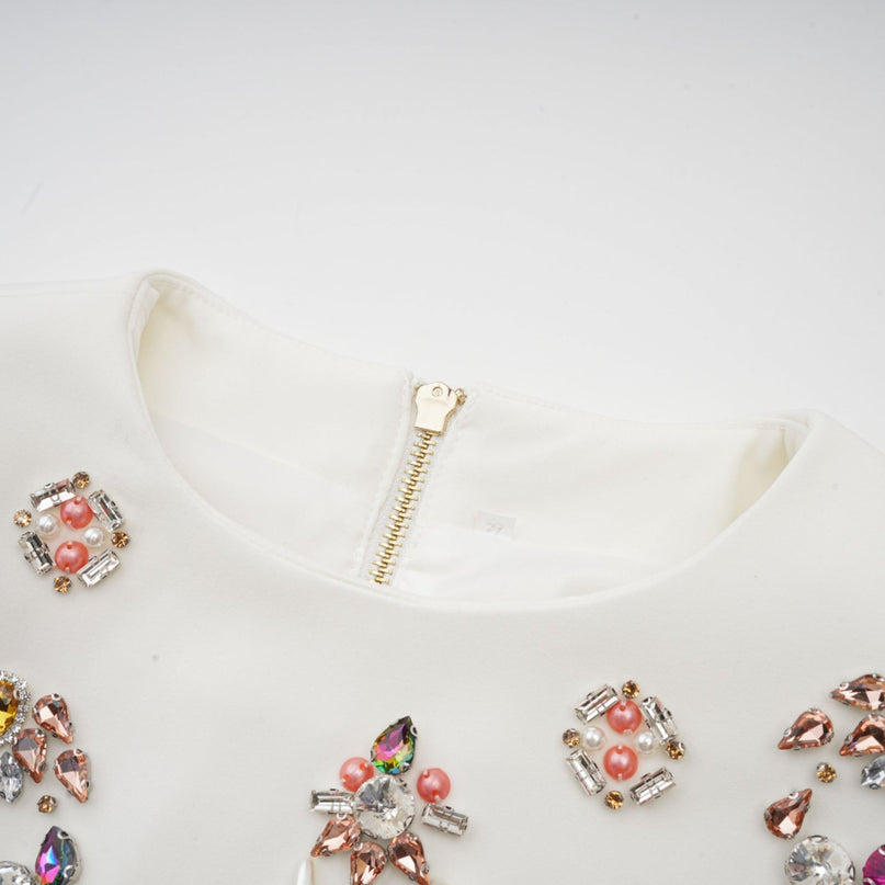 Jeanne white crystalembellished top  skirt matching set