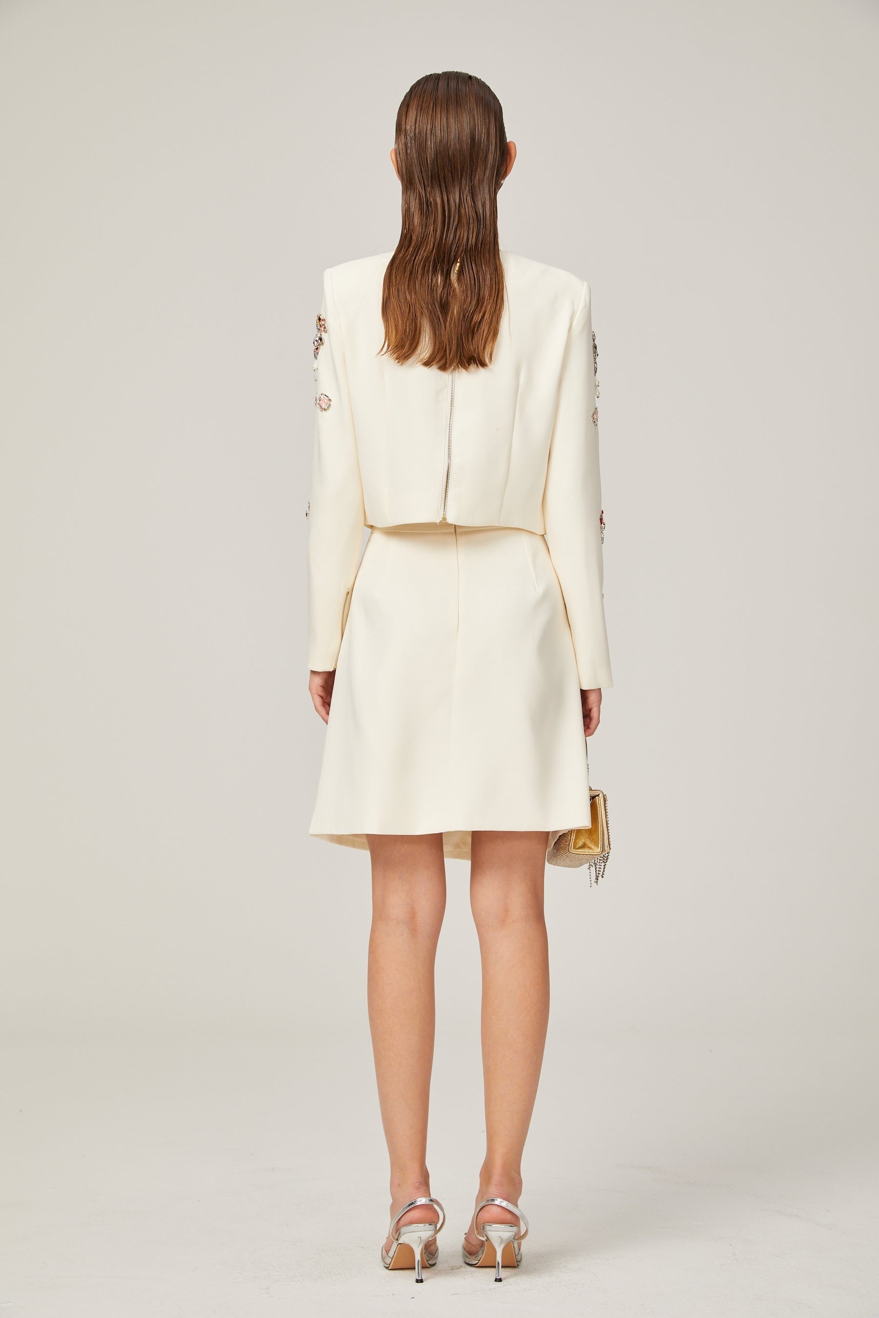 Jeanne white crystalembellished top  skirt matching set