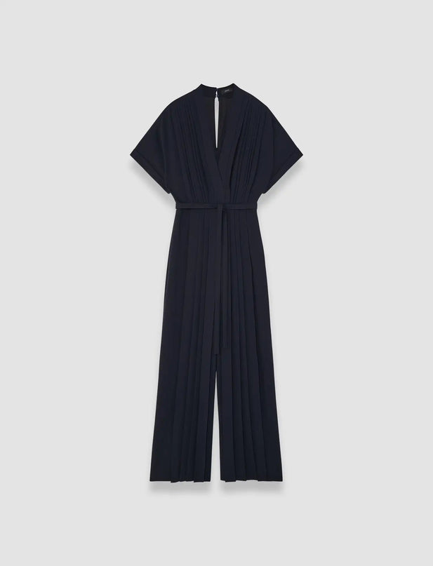 Jenna wearing Navy Blue Flared Sleeve Dress with V-Neckline and Natural Waist