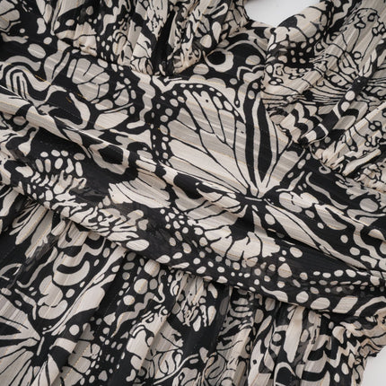Joanna Black and White Silk Mini Dress with V-Neckline and Cut-Out Design