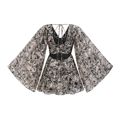 Joanna Black and White Silk Mini Dress with V-Neckline and Cut-Out Design