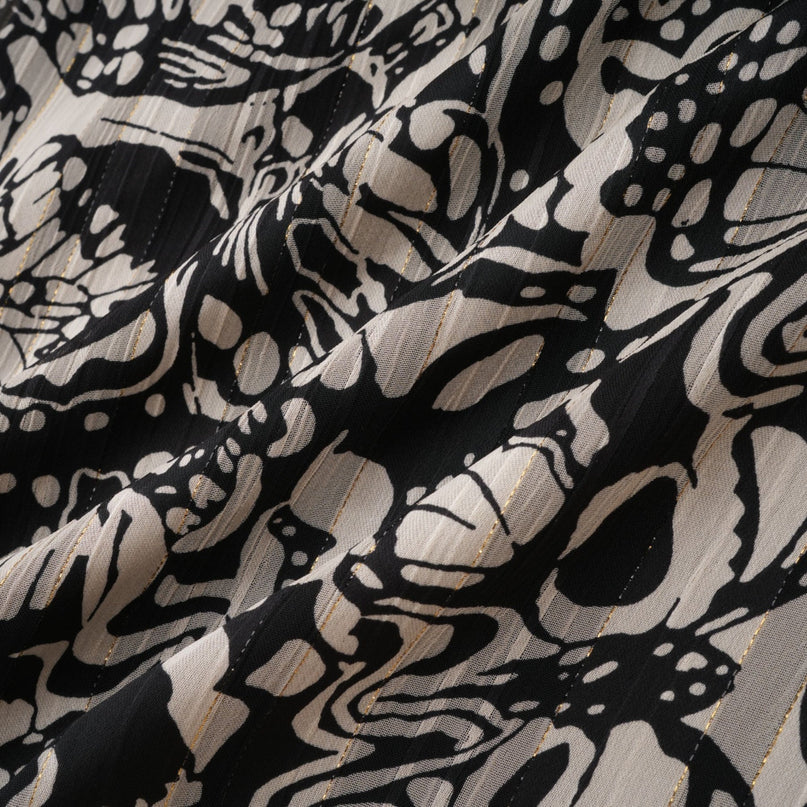 Joanna Black and White Silk Mini Dress with V-Neckline and Cut-Out Design