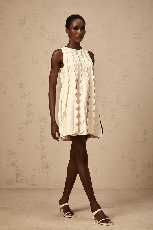 Joanna White Knitted Mini Dress with Wavy Detailing and Rear Tie Fastening