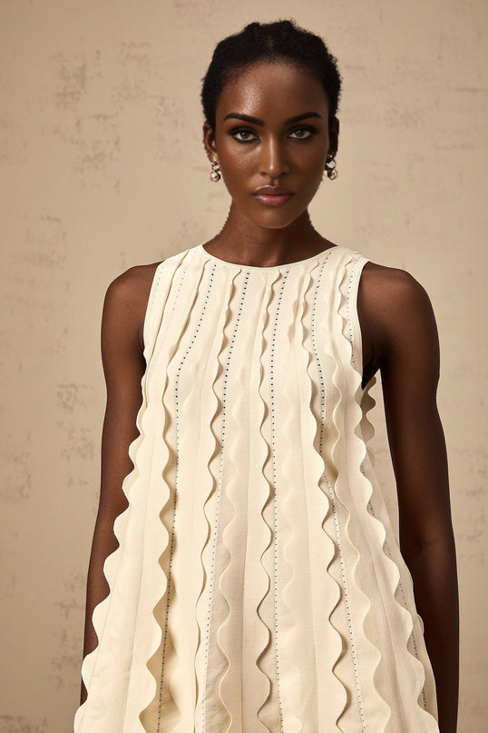 Joanna White Knitted Mini Dress with Wavy Detailing and Rear Tie Fastening