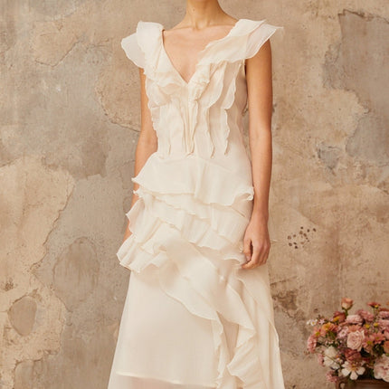 Jocelyn Maxi Dress Neutrals Ruffled Floral Elegance Terylene Fiber V-Neck Cap Sleeves Cinched Waist Faux-Flower Detailing Asymmetrical Hem Rear Zip Tie Fastening Romance Refinement
