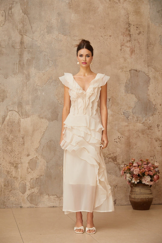 Jocelyn Maxi Dress Neutrals Ruffled Floral Elegance V-Neck Cap Sleeves Cinched Waist Faux-Flower Detailing Asymmetrical Hem Rear Zip Tie Fastening