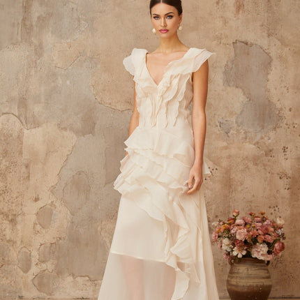 Jocelyn Maxi Dress Neutrals Ruffled Floral Elegance V-neck Cap Sleeves Cinched Waist Faux-Flower Detailing Asymmetrical Hem Rear Zip Tie Fastening