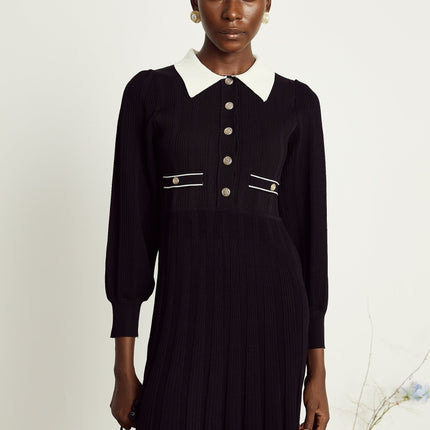 Juliana Black Ribbed Knit Mini Dress Balloon Sleeves A-line Faux Pocket Detail Flared Hem Press-stud Fastening 85% Terylene 15% Spandex