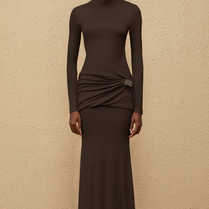 Juliet Maxi Dress in Brown with crew neck, long sleeves, fitted waistline, gathered detailing, shirred panel, embossed silver-tone hardware, rear slit, flared hem, Lyocell and Spandex composition