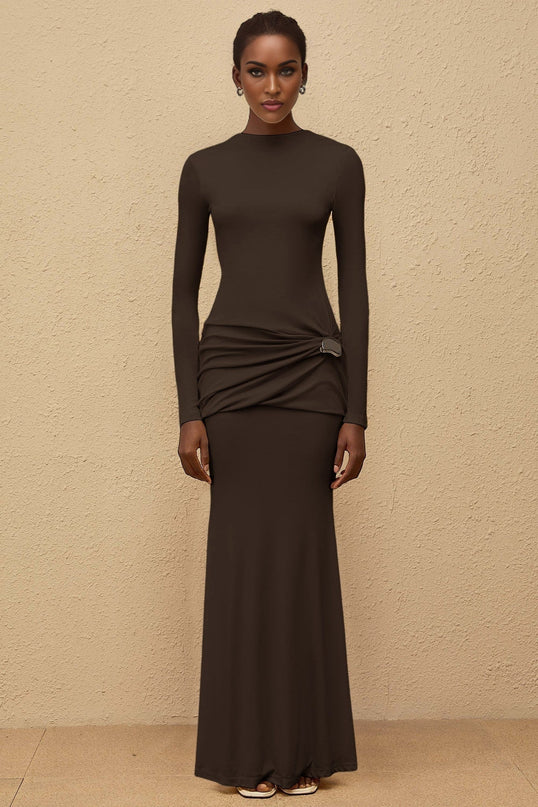 Juliet Maxi Dress in Brown with crew neck, long sleeves, fitted waistline, gathered detailing, shirred panel, embossed silver-tone hardware, rear slit, flared hem, Lyocell and Spandex composition
