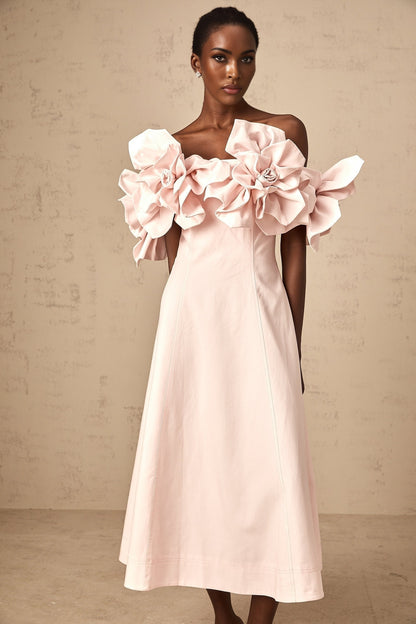 Juliette pink midi dress with offshoulder neckline and three dimensional petal details