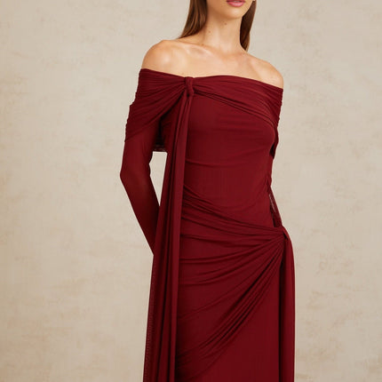 Juniper Twilight Sonata Gown Red off-the-shoulder long sleeves front tie detail pleated asymmetrical ruched draped floor-length hem 83% cotton 17% spandex