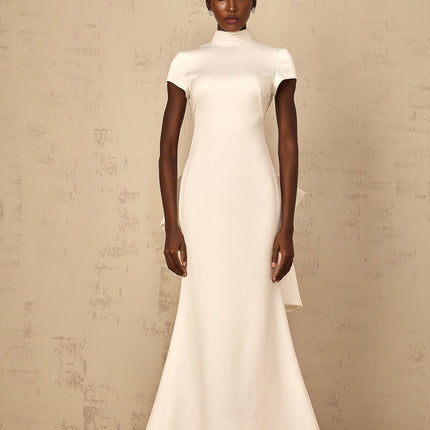 Kenzie White Maxi Dress with Mock Neck Cap Sleeves Open Back Detail Oversize Bow Mermaid Hem