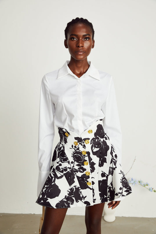 Kiara White & Black Shirt & Skirt Matching Set 100% Polyester Flared Cuffs Buttoned Cuffs Classic Collar Black & White Flared Skirt Rose Buttons Chic Floral Print Thigh-Length Effortlessly Chic Versatile 5'10 Models Sophistication