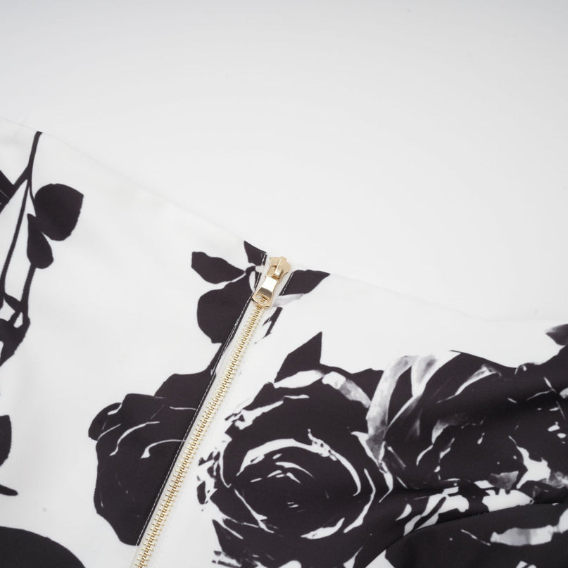 Kiara White & Black Shirt & Skirt Matching Set with flared cuffs, buttoned cuffs, classic collar, rose buttons, and chic floral print in 100% Polyester
