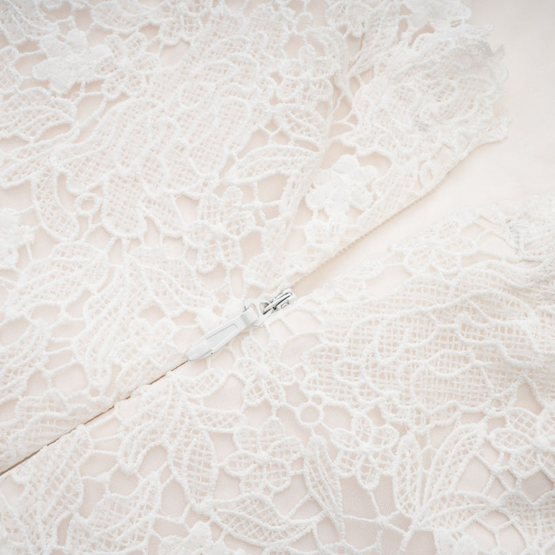 Kimberly White Lace Cut Out Ruffle Hem Mini Dress
