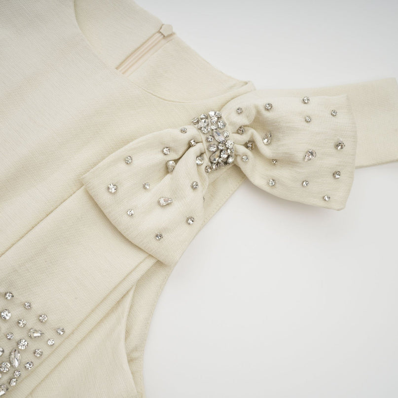 Landry White Midi Dress Crystal Accent Bow Sleeveless Round Neck Cinched Waist Pleated Tulle Panelling Opulent Embellishment Rear Zip Closure Ankle Length Luxurious Terylene Fiber Special Occasion