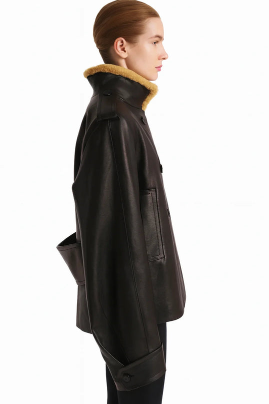 Laura Black Dress Streetwear Style leather jacket with lamb fur accents and patchwork pattern