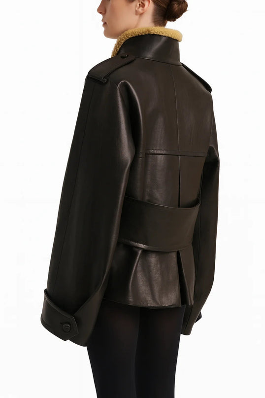 Laura wearing The Black Dress Streetwear Style women's leather jacket with lamb fur accents and patchwork pattern