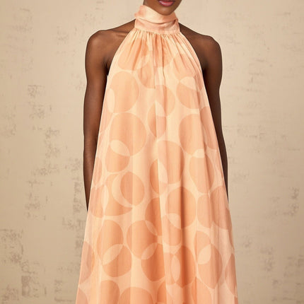 Layla Coral Pink Halterneck Maxi Dress with Ruffled Hem and Intricate Pattern Print
