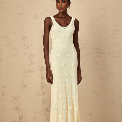 Leona Maxi Dress in Neutrals crochet knit and floral embroidery U-neck sleeveless cut-out detailing rear tie fastening 58% Cellulose fiber 42% Cotton