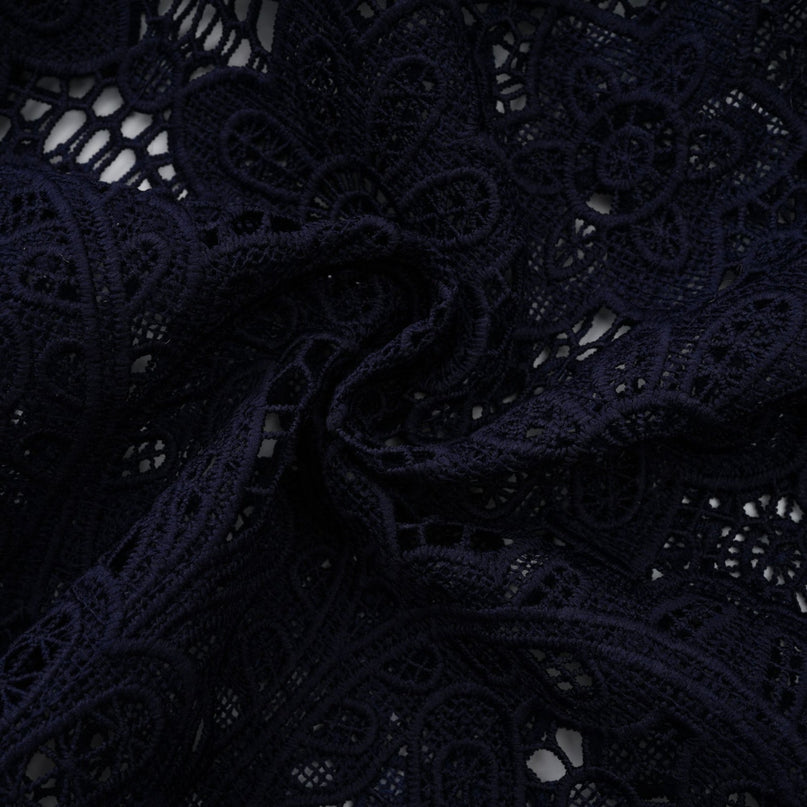Lesly Floral Midi Dress in Dark Blue & White Crochet Lace Detailing Classic Collar Floral Appliqué Belted Waist Scalloped Hem Openwork Design Gold-tone Buttons Flap Pockets Embossed Luxury Front Press-stud Fastening Internal Slip Dress Calf-length 100% Terylene Fiber
