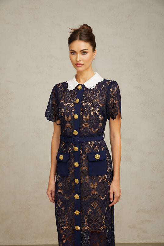 Lesly Floral Midi Dress in Dark Blue & White Crochet Lace Detailing Classic Collar Floral Appliqué Belted Waist Scalloped Hem Embossed Gold-Tone Buttons Flap Pockets