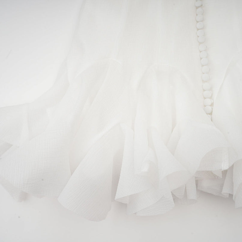 Letizia White Flared Sleeve Mini Dress with Sheer Button Hem